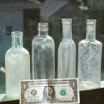 Old bottle and money